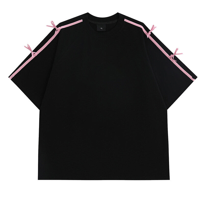 Damens oversized T-shirt med dekorativa knytband Mirla-Eva Jonsson