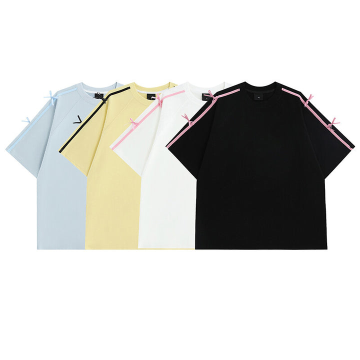 Damens oversized T-shirt med dekorativa knytband Mirla-Eva Jonsson