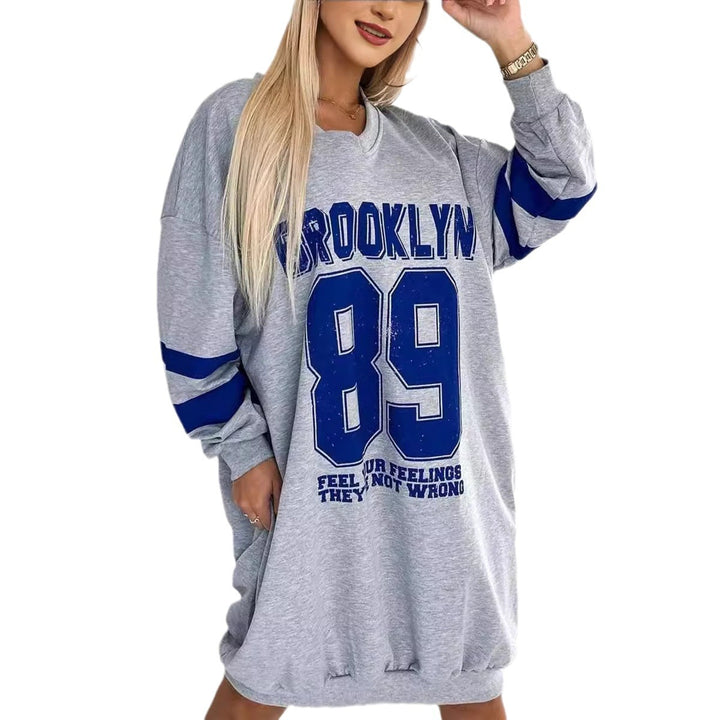 Damens oversized fritidsklänning med rundad fåll och V-ringning Mirla-Eva Jonsson