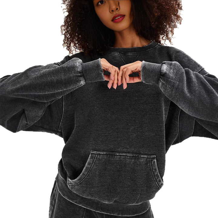 Damens oversized huvtröja med kängurufickor och mjukt innerfoder Mirla-Eva Jonsson