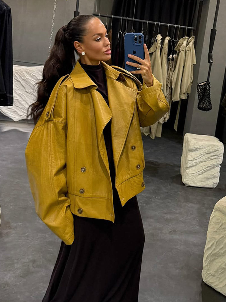 Damens oversized konstläderjacka med dubbel knappslå och fashionabel klipp Mirla-Eva Jonsson
