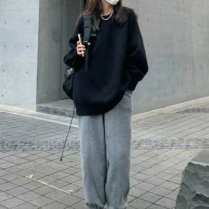 Damens oversized stickad tröja med ribbat mönster och vid passform Mirla-Eva Jonsson