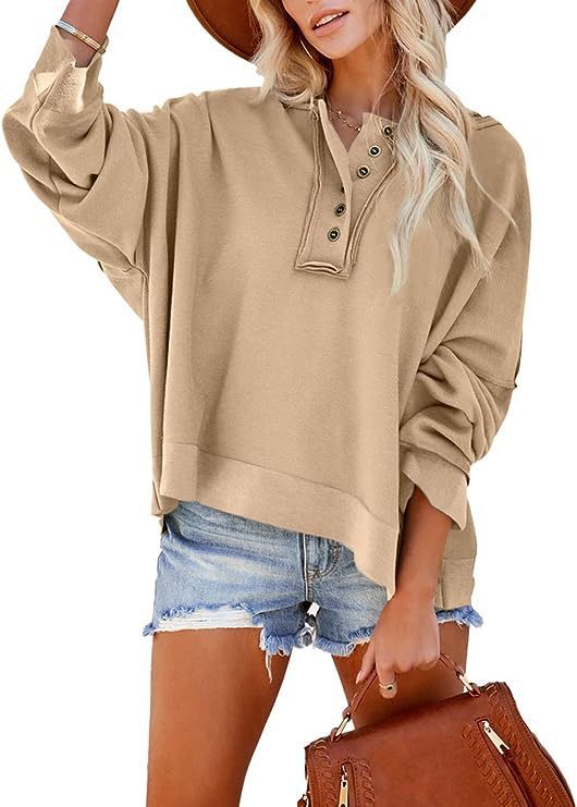 Damens oversized sweatshirt med knappslå Mirla-Eva Jonsson
