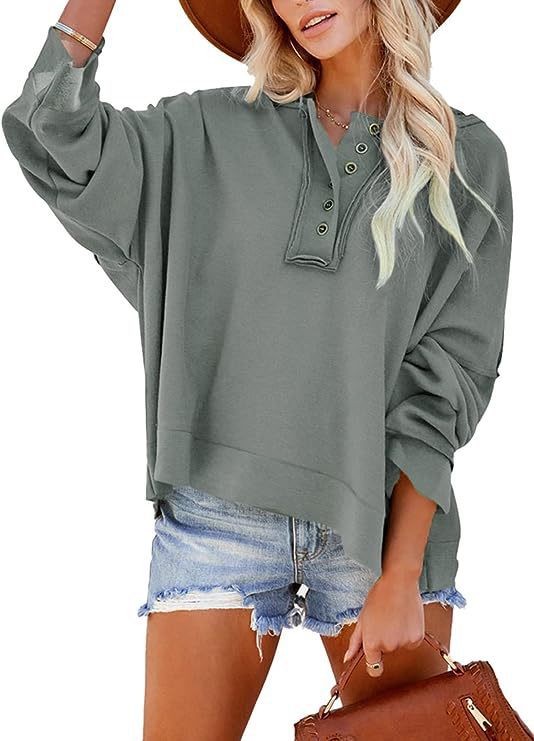 Damens oversized sweatshirt med knappslå Mirla-Eva Jonsson