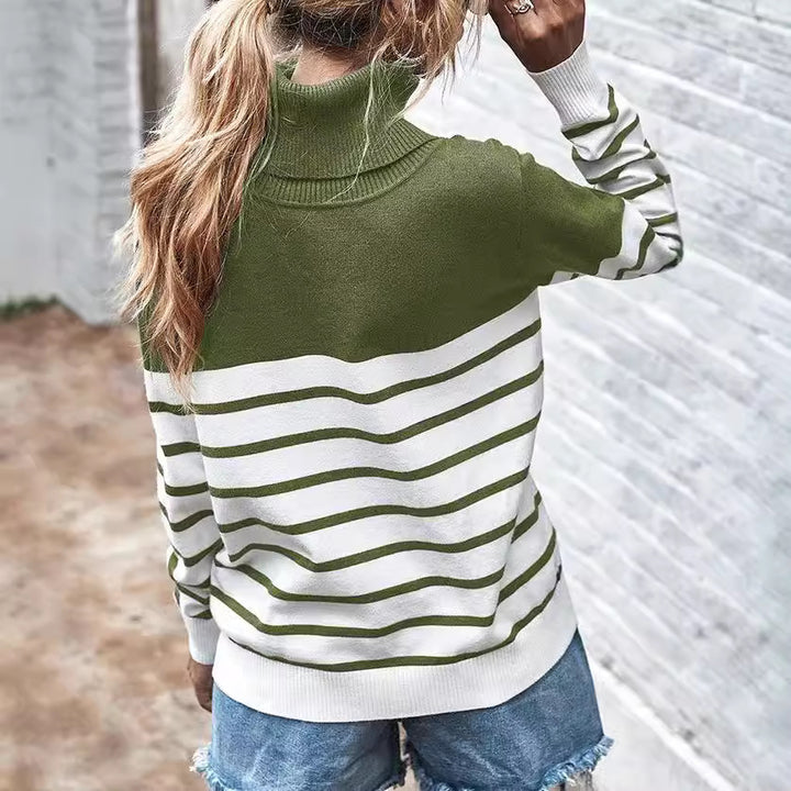 Damens stickad tröja med en modern hög krage och bred randig mönster Mirla-Eva Jonsson