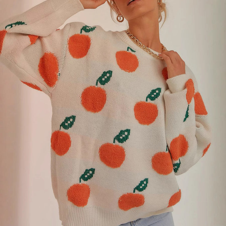 Damens stickad tröja med lekfullt fruktdesign Mirla-Eva Jonsson