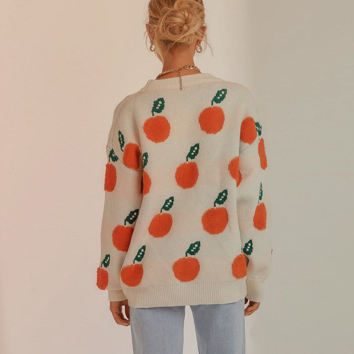 Damens stickad tröja med lekfullt fruktdesign Mirla-Eva Jonsson