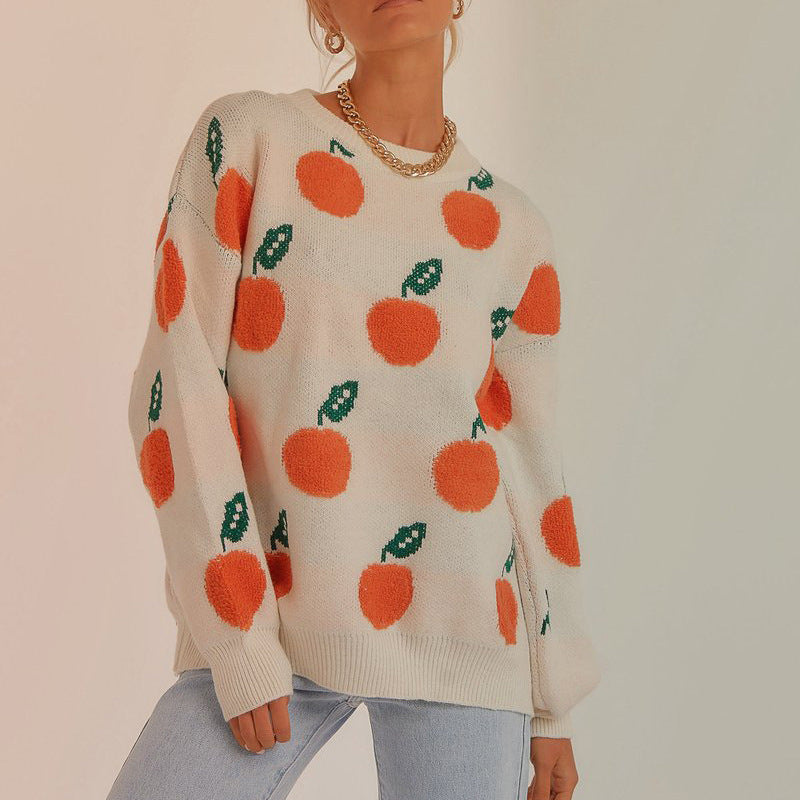 Damens stickad tröja med lekfullt fruktdesign Mirla-Eva Jonsson