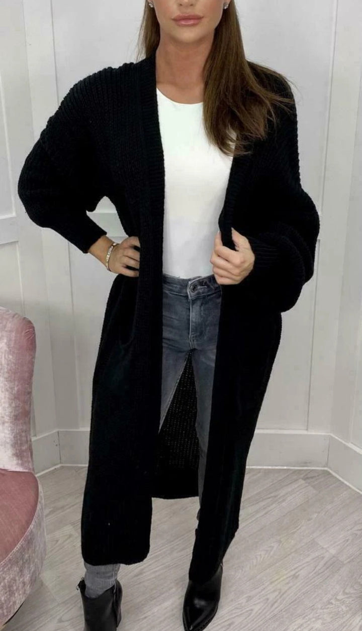 Damens stickmantel med djupa fickor och moderna detaljer Eva Jonsson-Eva Jonsson