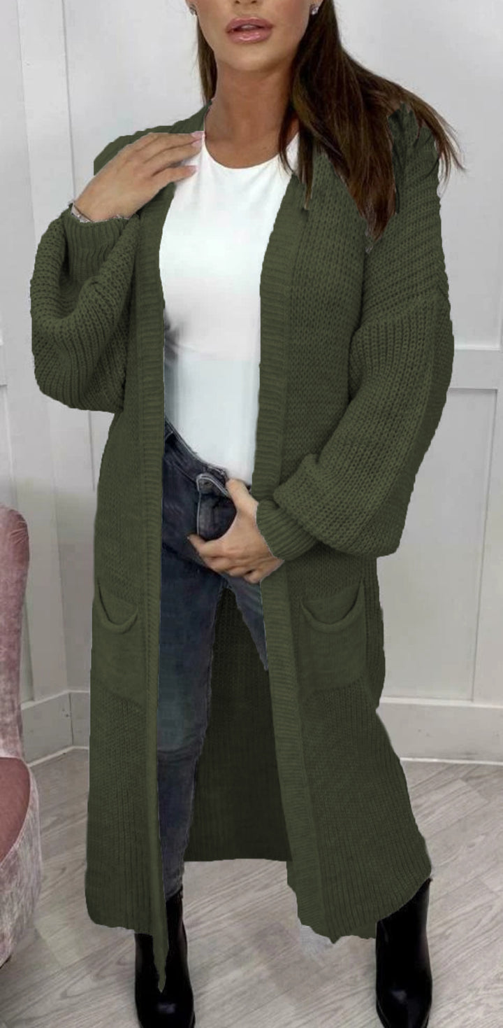 Damens stickmantel med djupa fickor och moderna detaljer Eva Jonsson-Eva Jonsson