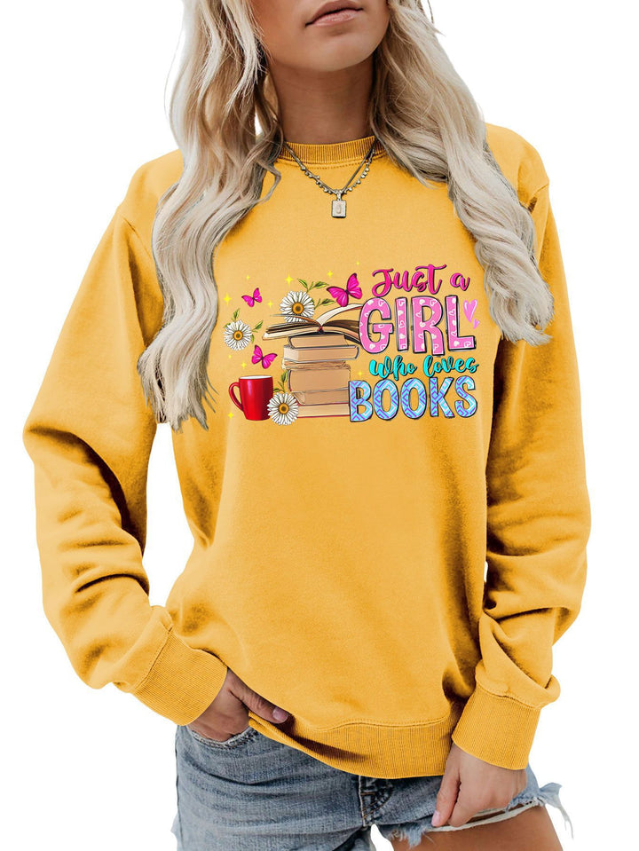 Damens sweatshirt med iögonfallande bokmotiv och avslappnad passform Mirla-Eva Jonsson