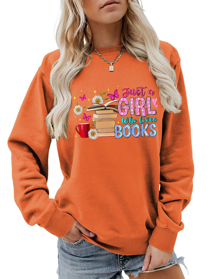 Damens sweatshirt med iögonfallande bokmotiv och avslappnad passform Mirla-Eva Jonsson