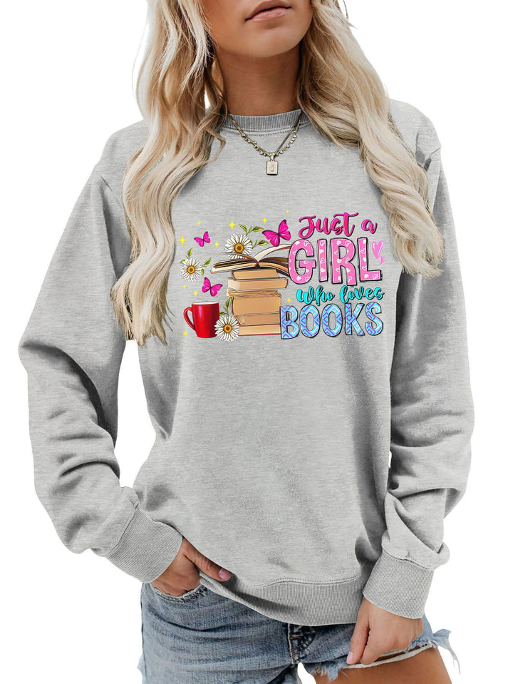 Damens sweatshirt med iögonfallande bokmotiv och avslappnad passform Mirla-Eva Jonsson
