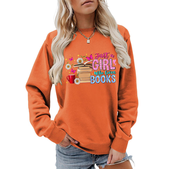 Damens sweatshirt med iögonfallande bokmotiv och avslappnad passform Mirla-Eva Jonsson