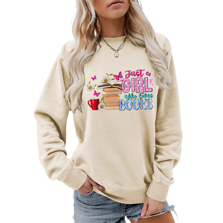Damens sweatshirt med iögonfallande bokmotiv och avslappnad passform Mirla-Eva Jonsson