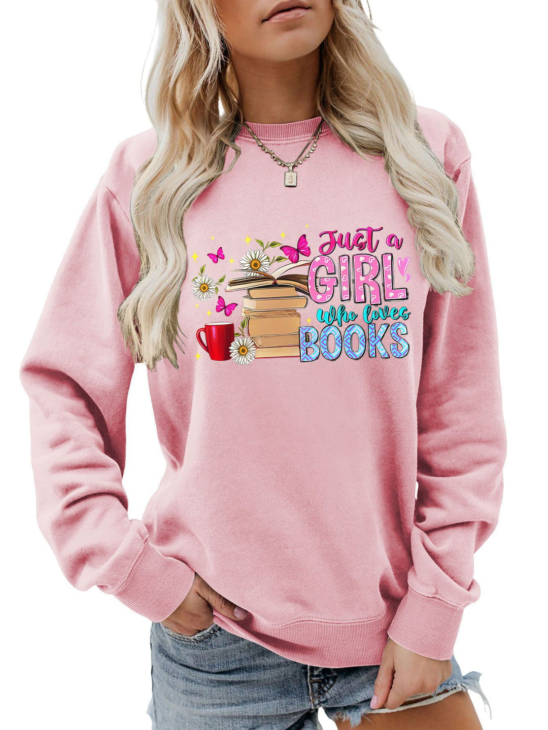 Damens sweatshirt med iögonfallande bokmotiv och avslappnad passform Mirla-Eva Jonsson