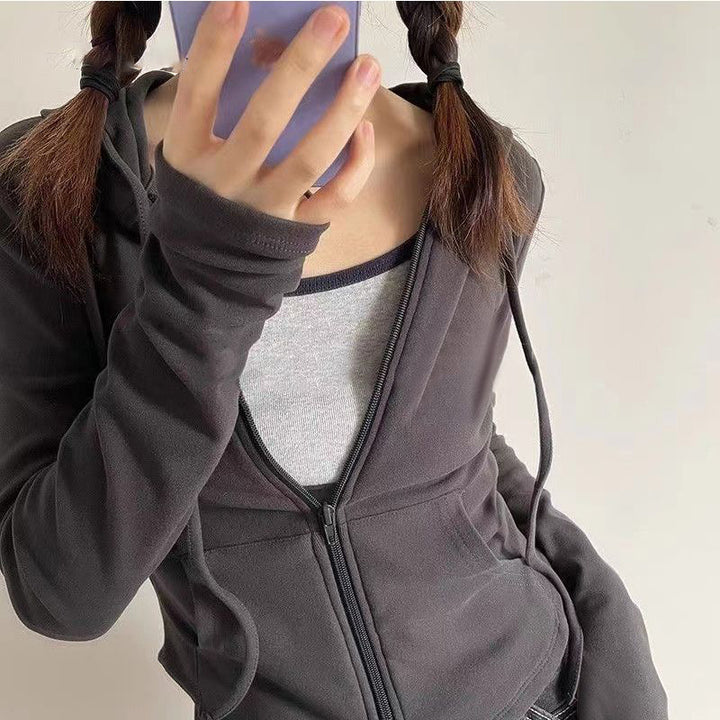 Damens trendiga hoodie med praktisk dragkedja Mirla-Eva Jonsson