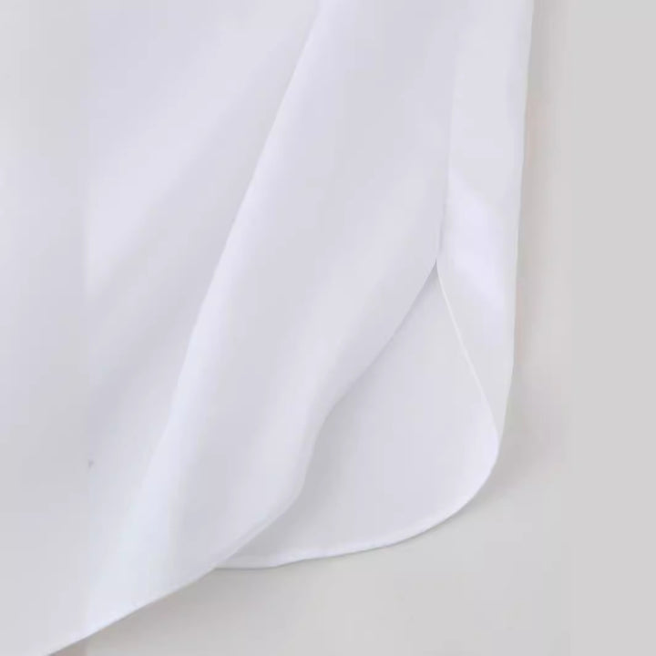 Damensmart designad blus med blomsterapplikationer Mirla-Eva Jonsson