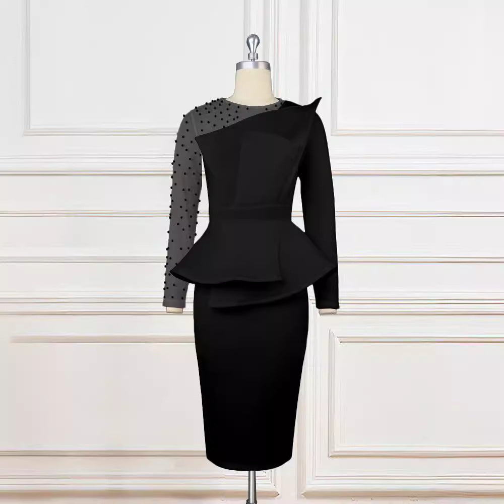 Damensmidkjole med gennemsigtige puffærmer og dekorativ peplum Mirla-Eva Jonsson