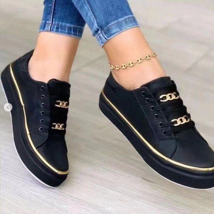 Damensneakers med modernt satintyg och eleganta guldfärgade accenter Mirla-Eva Jonsson