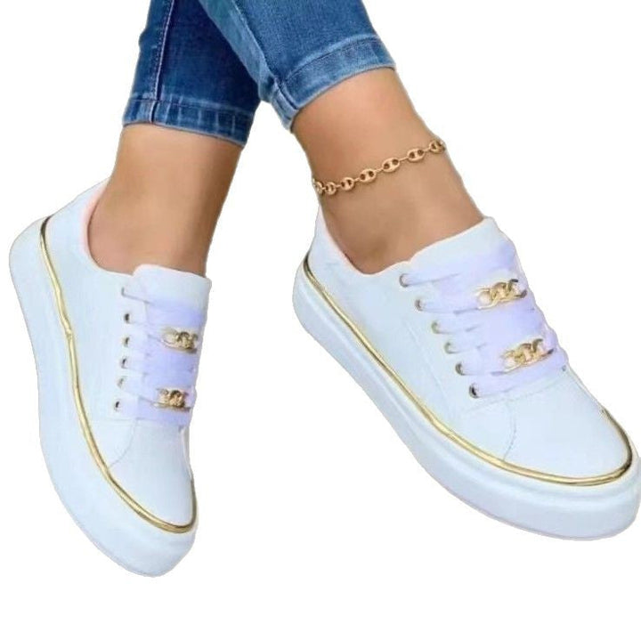 Damensneakers med modernt satintyg och eleganta guldfärgade accenter Mirla-Eva Jonsson