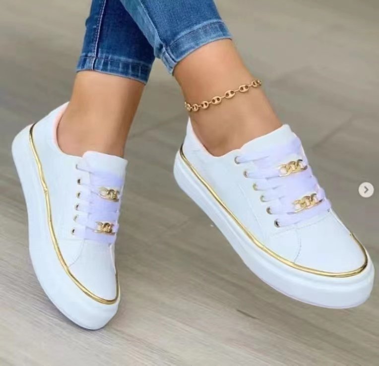 Damensneakers med modernt satintyg och eleganta guldfärgade accenter Mirla-Eva Jonsson