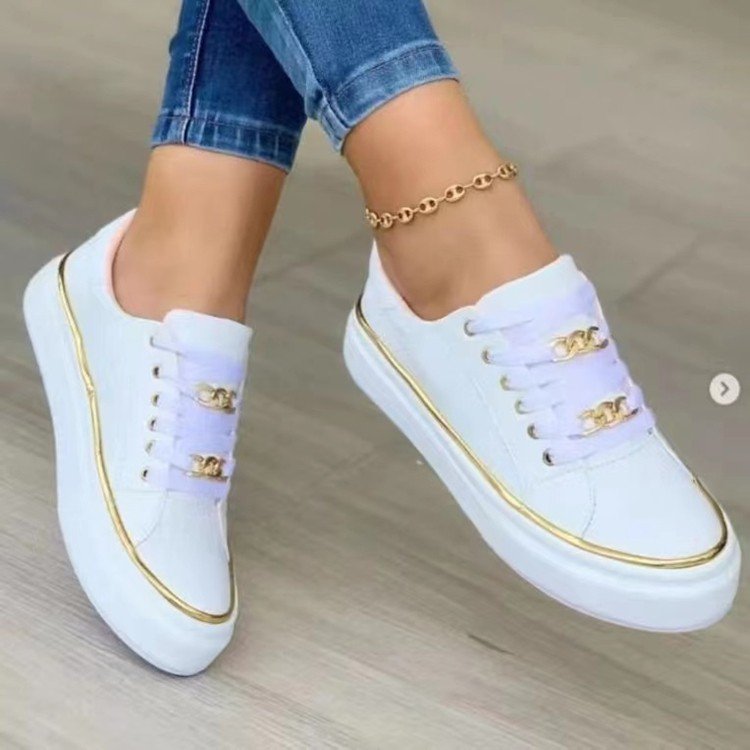 Damensneakers med modernt satintyg och eleganta guldfärgade accenter Mirla-Eva Jonsson