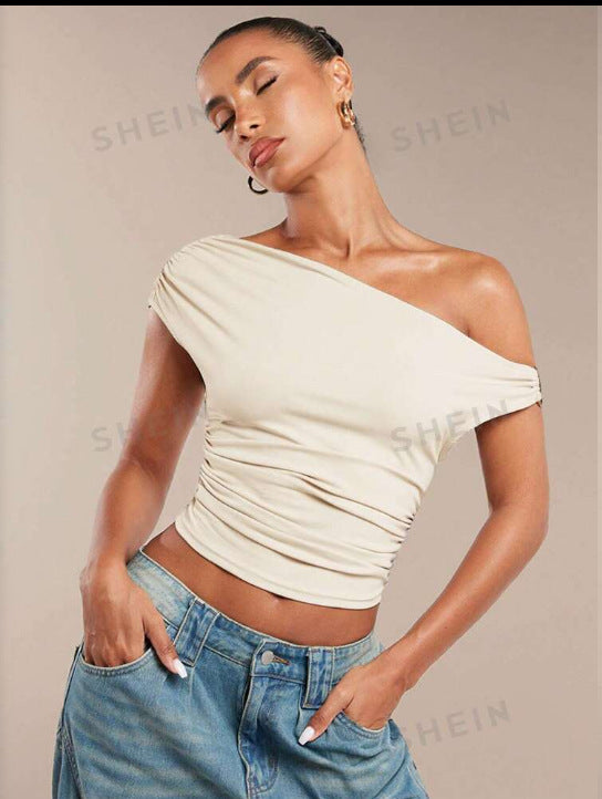 Damer Asymmetrisk Crop-Top med elegant vågdesign och raffinerad skärning Mirla-Eva Jonsson