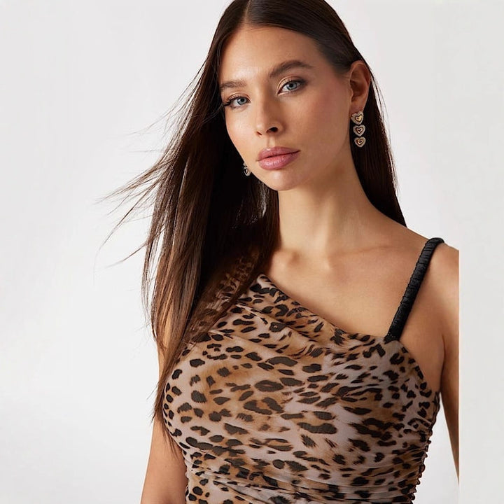Damer Asymmetrisk topp med leopardsmönster och raffinerade volanger Mirla-Eva Jonsson