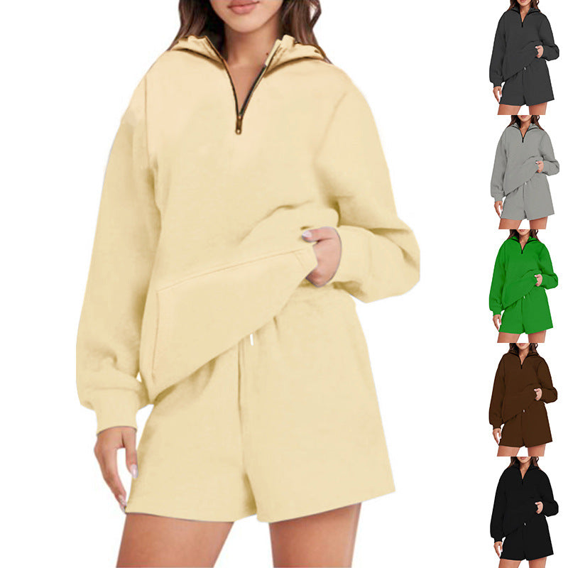 Damer Avslappnad Hoodie med kort dragkedja och praktiska fickor Mirla-Eva Jonsson