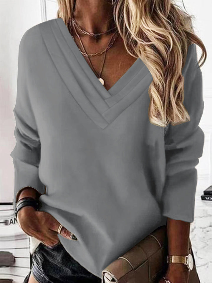 Damer Avslappnad V-ringad Tröja med eleganta Fåror Mirla-Eva Jonsson