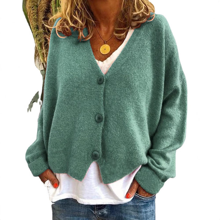 Damer Avslappnad stickad cardigan med öppen design och knäppbar stängning Eva Jonsson-Eva Jonsson