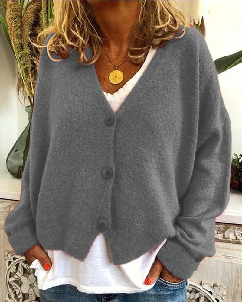 Damer Avslappnad stickad cardigan med öppen design och knäppbar stängning Mirla-Eva Jonsson