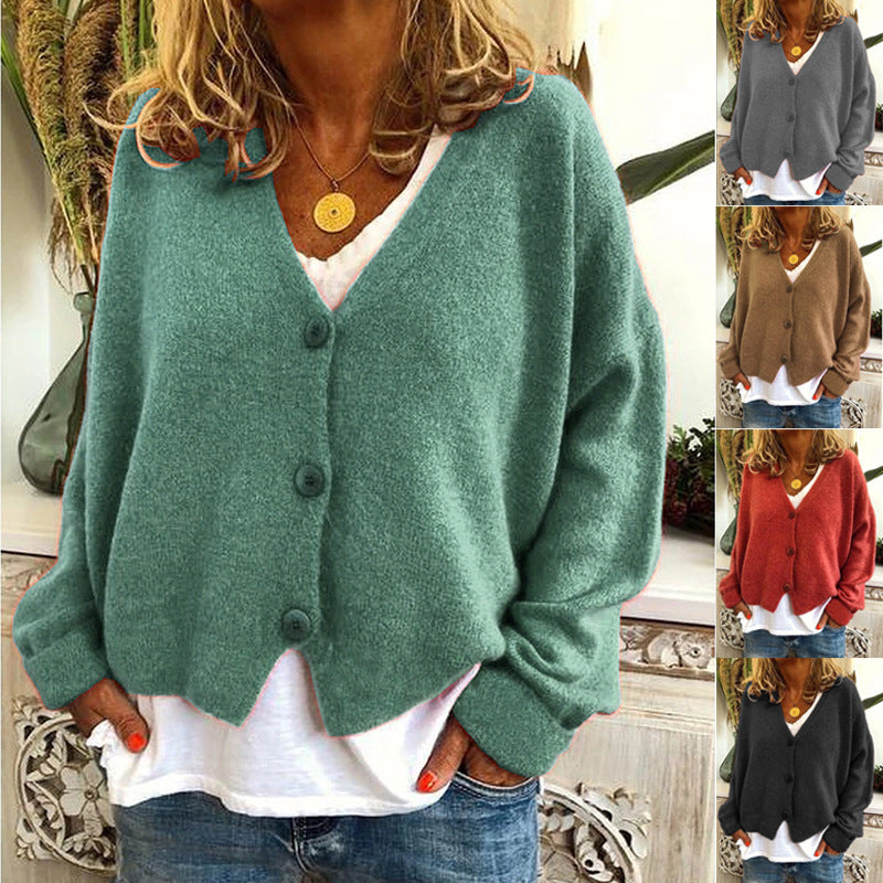 Damer Avslappnad stickad cardigan med öppen design och knäppbar stängning Mirla-Eva Jonsson