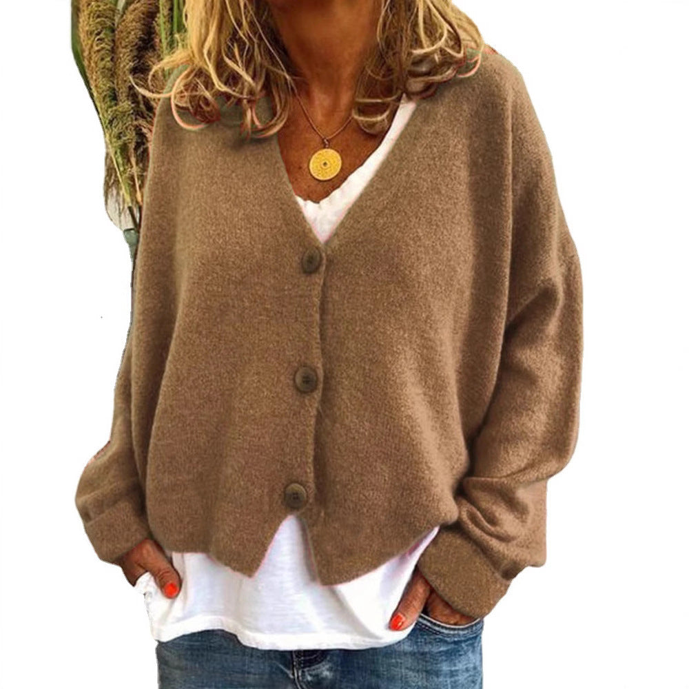Damer Avslappnad stickad cardigan med öppen design och knäppbar stängning Mirla-Eva Jonsson
