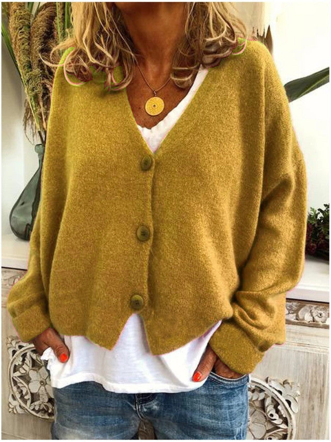 Damer Avslappnad stickad cardigan med öppen design och knäppbar stängning Mirla-Eva Jonsson