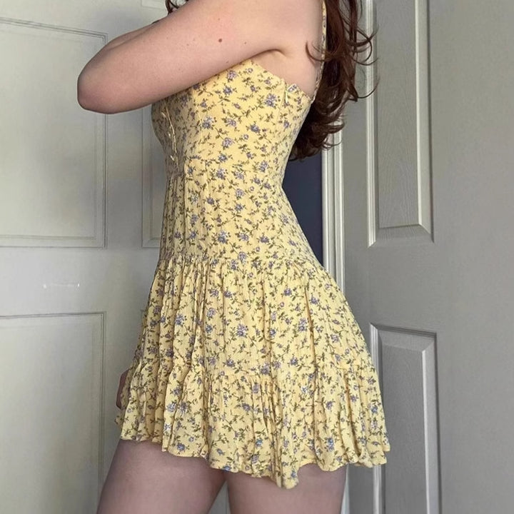Damer Blommig A-linje sommarklänning med volangslut och spagettistänger Mirla-Eva Jonsson