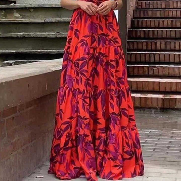 Damer Boho Maxikläder med voluminösa ryscharmar och stufad kjol Mirla-Eva Jonsson