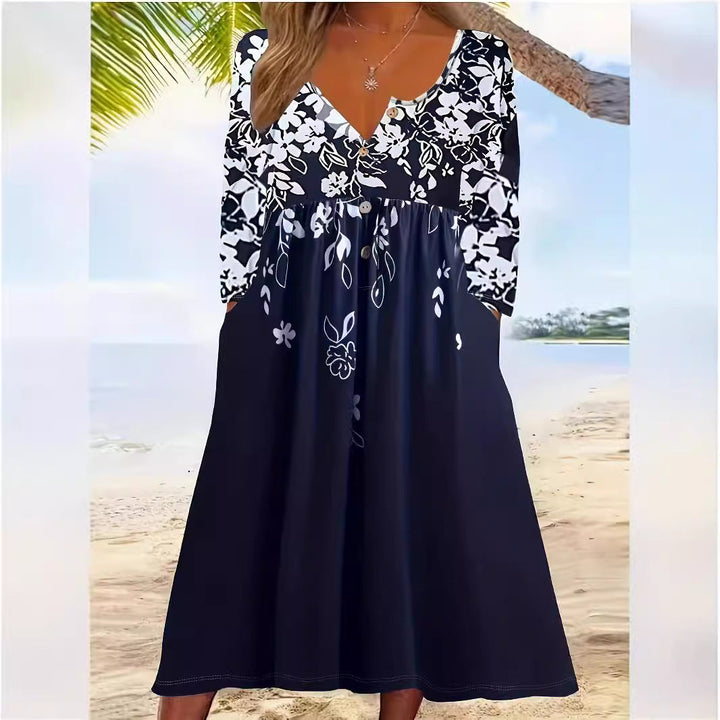 Damer Boho Maxiklänning med Blommig Tryck och Knapparbar Overdel Mirla-Eva Jonsson