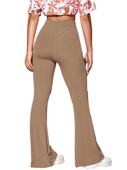 Damer Bootcut-byxor av elastiskt ribbat material med hög midja Mirla-Eva Jonsson