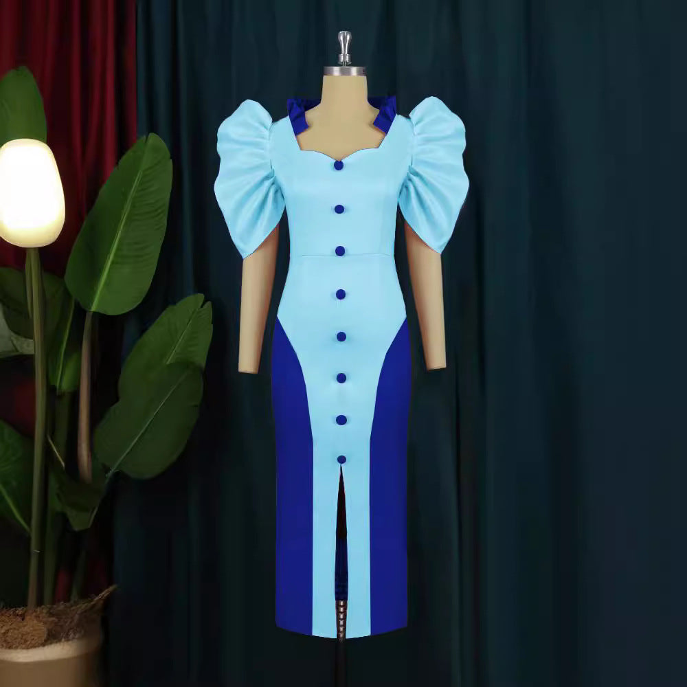 Damer Cocktailklänning med voluminösa puffärmar och elegant slits Mirla-Eva Jonsson