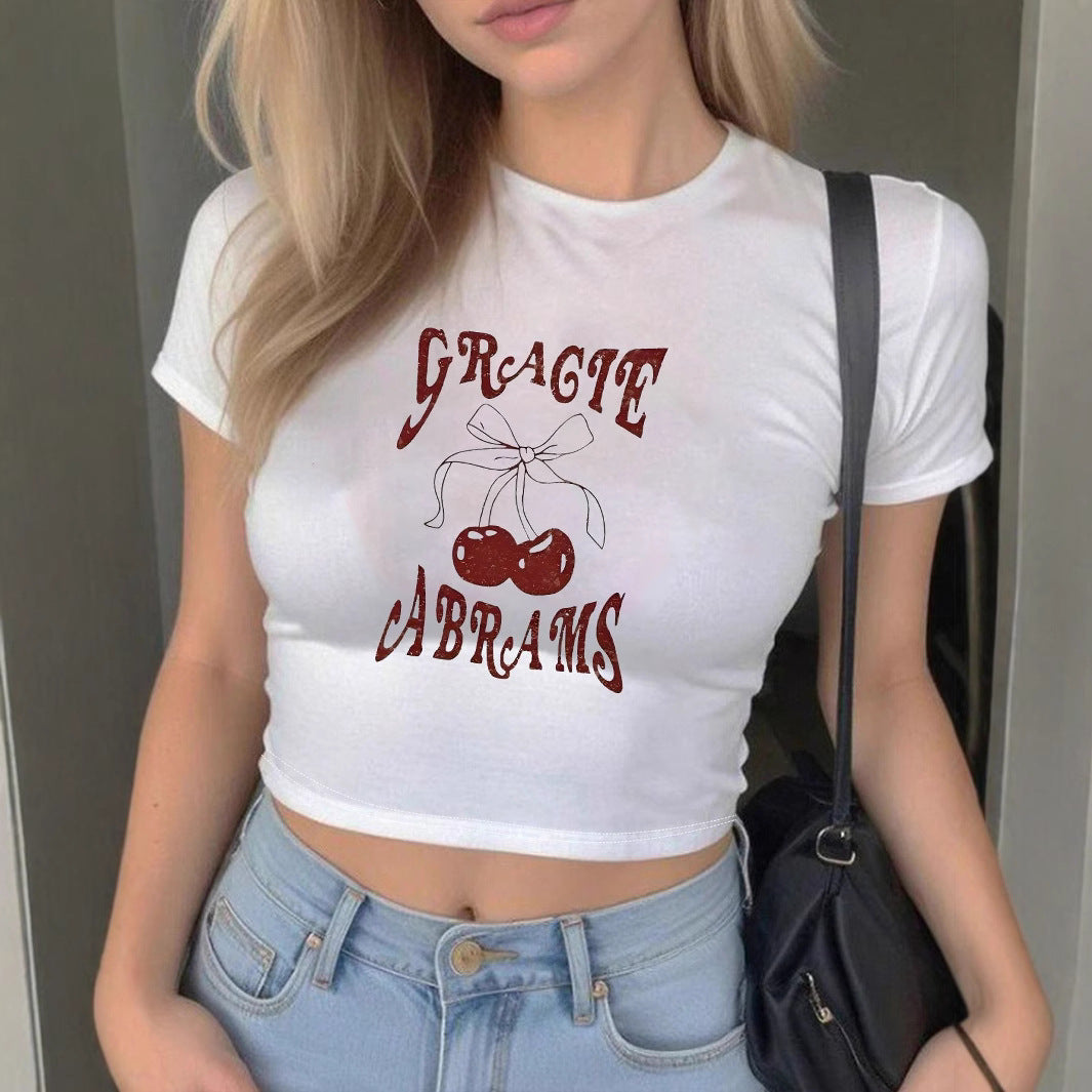Damer Crop-T Shirt med slätt körsbärsmönster och lekfullt tryck Mirla-Eva Jonsson