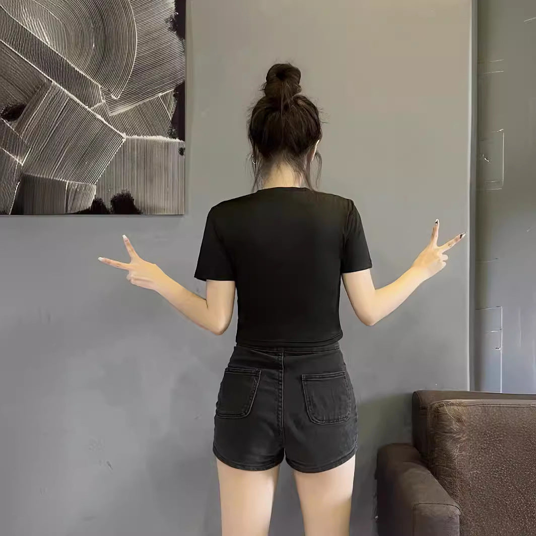 Damer Crop-T-shirt med glänsande stjärnmotiv och figuranpassad skärning Mirla-Eva Jonsson