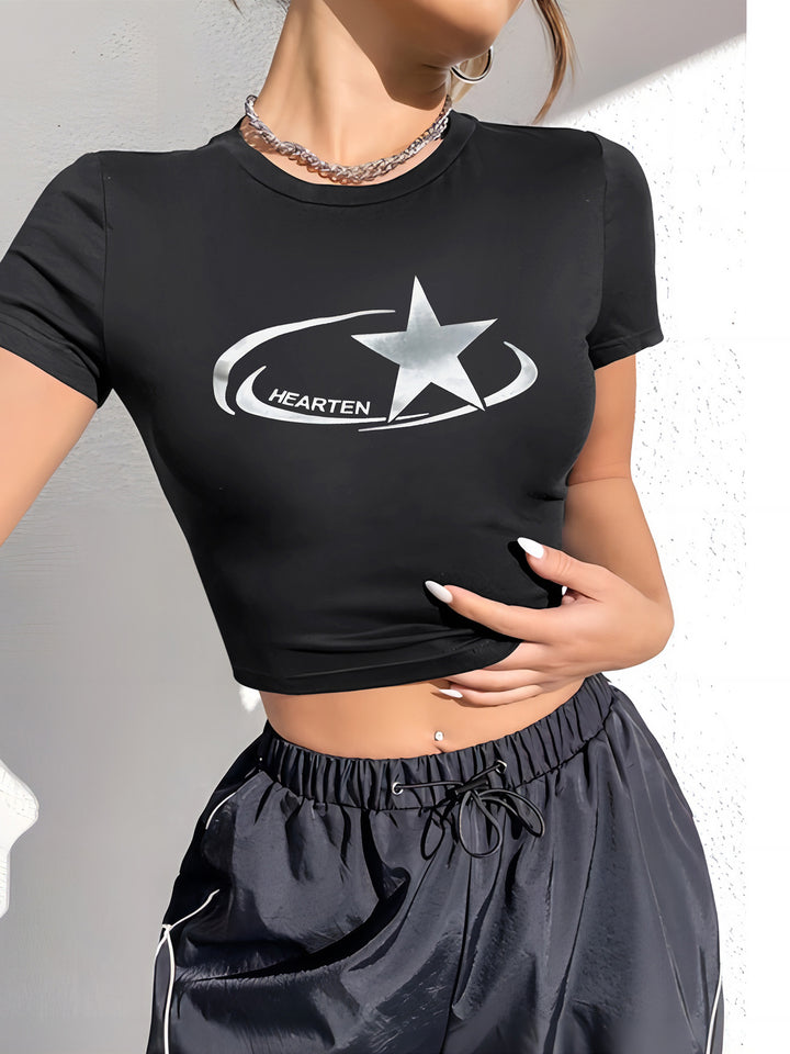 Damer Crop-T-shirt med glänsande stjärnmotiv och figuranpassad skärning Mirla-Eva Jonsson