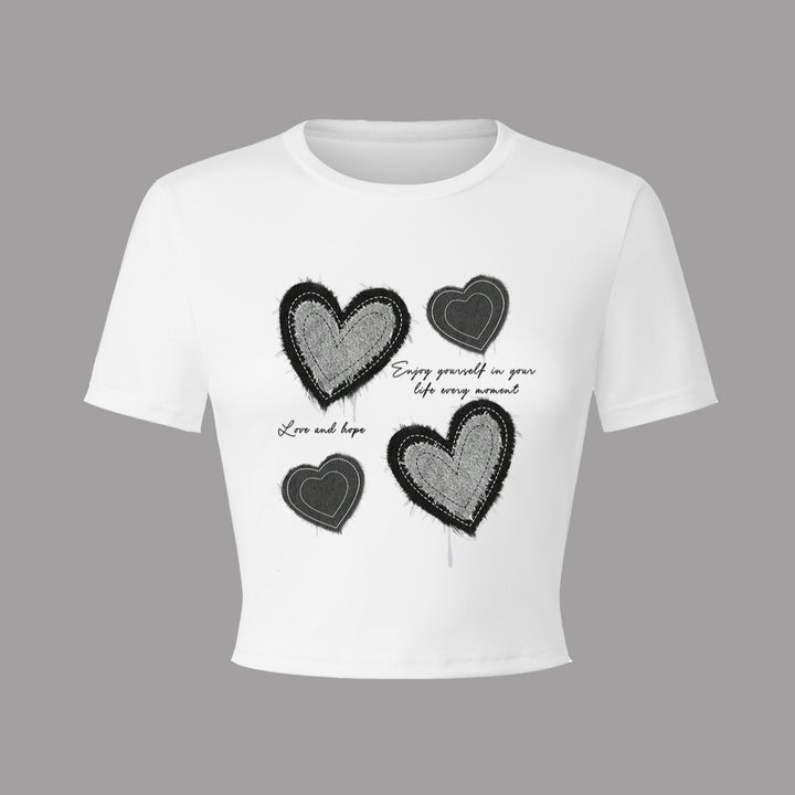 Damer Crop-T-shirt med kreativt hjärtmotiv och motiverande text Mirla-Eva Jonsson