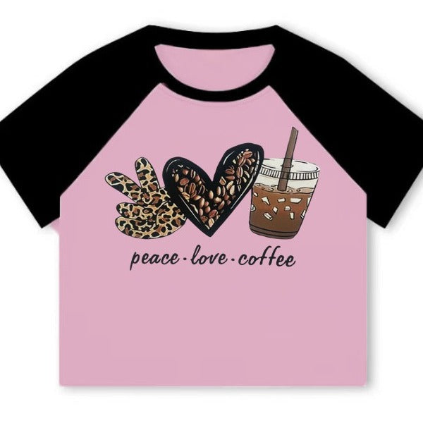 Damer Crop-T-shirt med kreativt kaffe-motiv och avslappnad passform Mirla-Eva Jonsson
