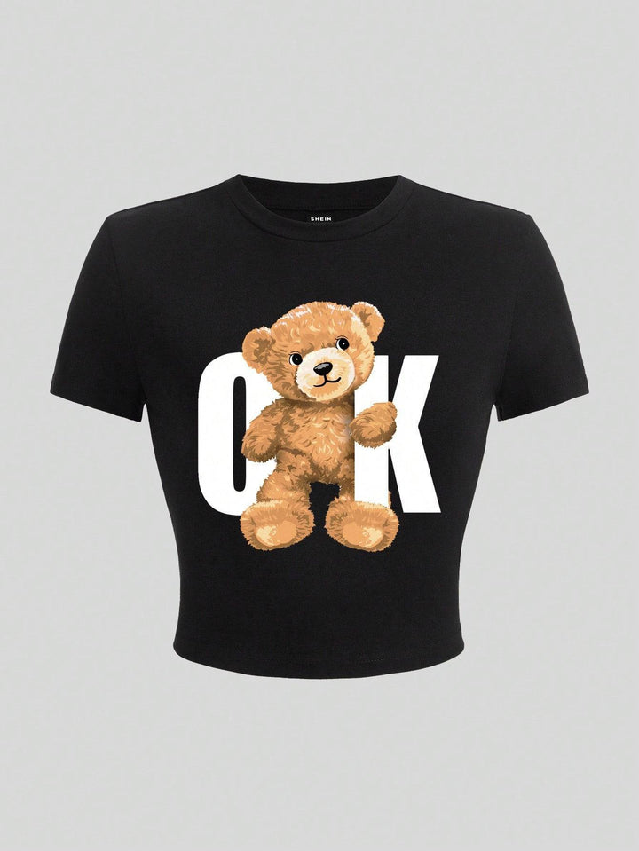 Damer Crop-T-shirt med lekfullt björnmotiv och moderiktig text Mirla-Eva Jonsson