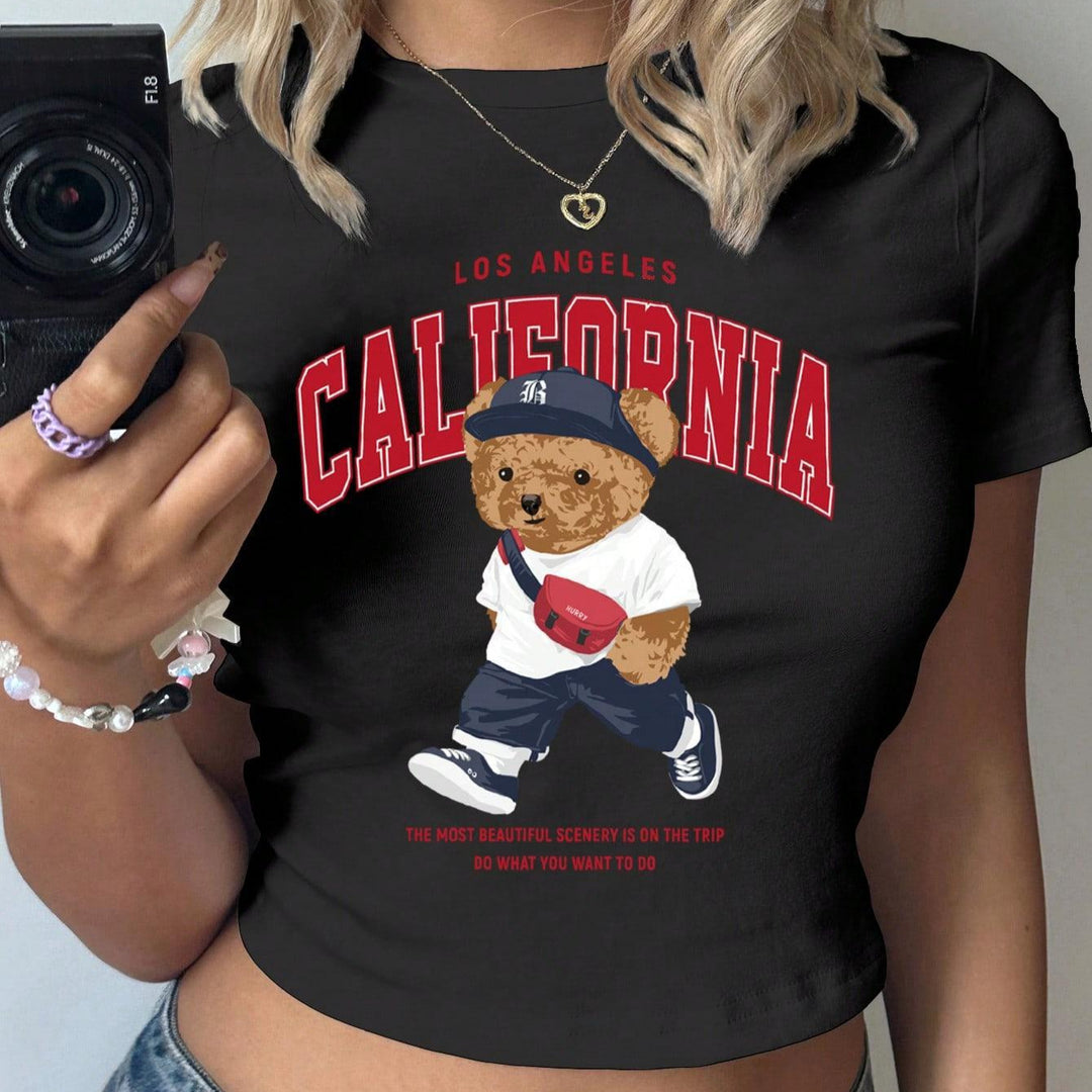 Damer Crop-T-shirt med lekfullt björnmotiv och moderiktig text Mirla-Eva Jonsson