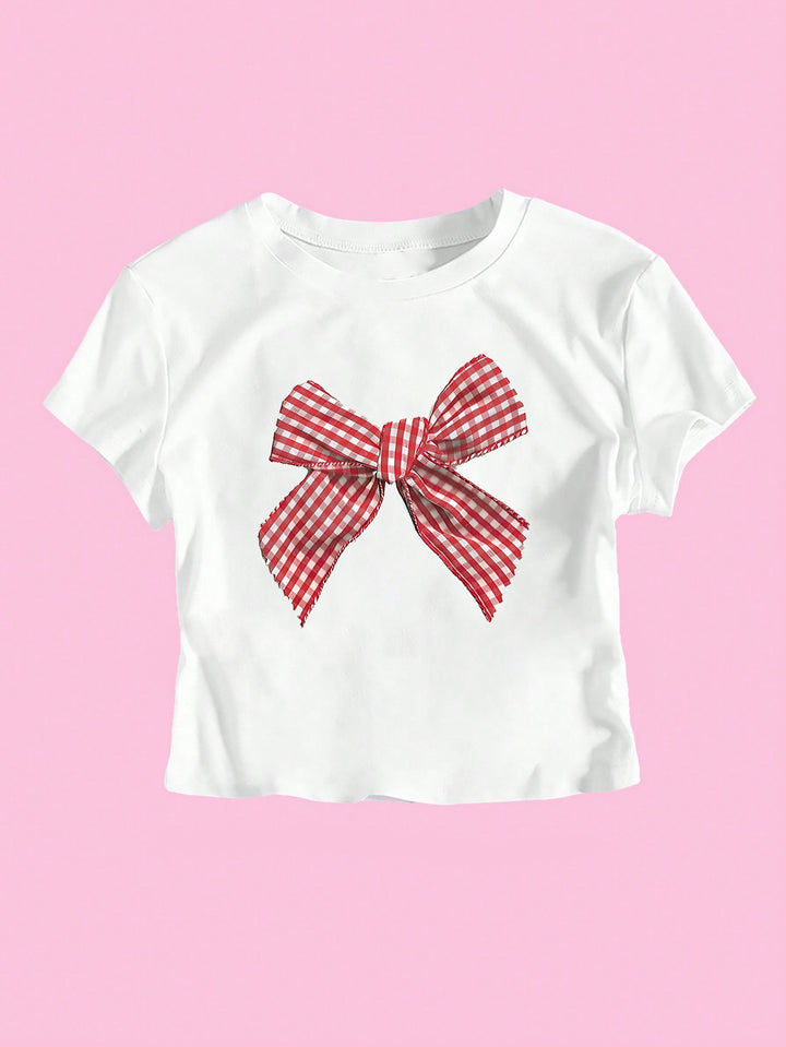 Damer Crop-T-shirt med lekfullt rutigt bandmotiv och avslappnad skärning Mirla-Eva Jonsson
