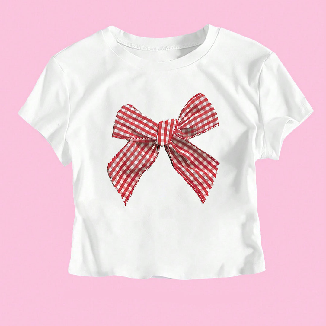 Damer Crop-T-shirt med lekfullt rutigt bandmotiv och avslappnad skärning Mirla-Eva Jonsson